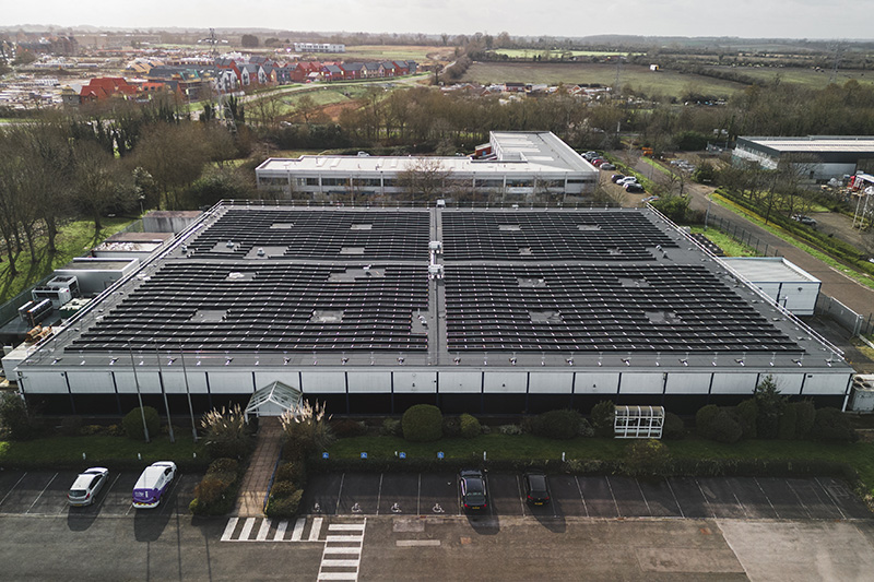 Aerial view of the Milton Keynes data centre with solar panels across its roof